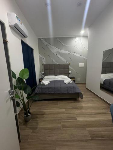Maison Ecce Hom0