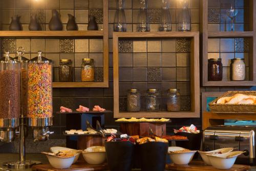 a display of food on a counter in a store at Historico Central Hotel in Mexico City