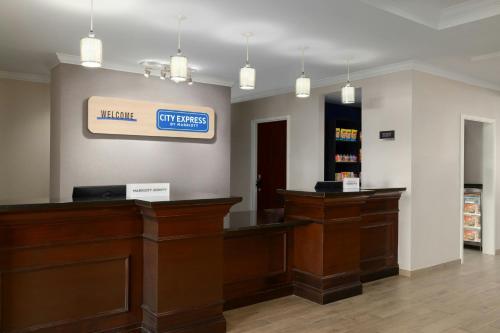 a law office with a sign on the wall at City Express by Marriott Washington, DC Northeast in Washington, D.C.