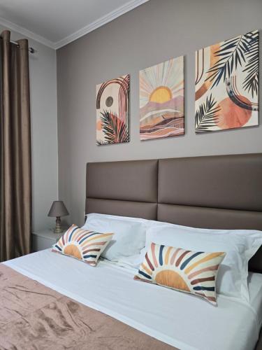 เตียงในห้องที่ Doar Apartment