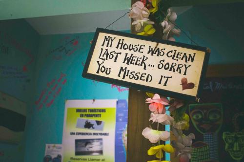 a sign that says my house was clean last weeksorry you missed it at Hostal Maitencillo Norte in Maitencillo