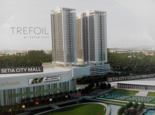 a group of tall buildings in a city at Warm Stay at Trefoil in Setia Alam