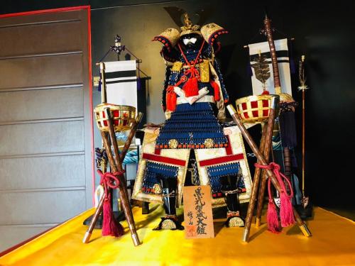 a table with a dress on it with two chairs at Yokohama Sakae-chou Ninja House #JA1 in Yokohama