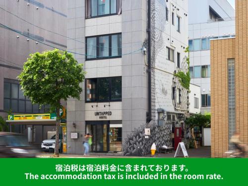anatomization tax is included in the room rate in a building at Untapped Hostel in Sapporo