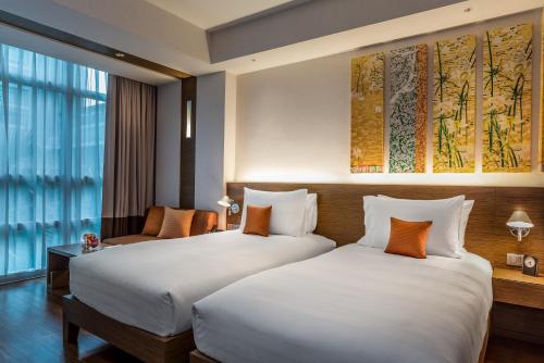 Katil atau katil-katil dalam bilik di Pullman Bangkok King Power
