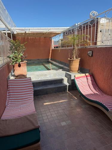 Swimmingpoolen hos eller tæt på Riad DIHYA & Rooftop Pool