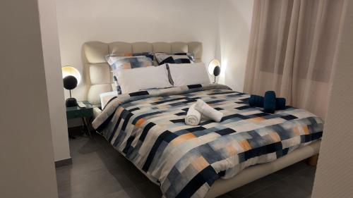 Ένα ή περισσότερα κρεβάτια σε δωμάτιο στο Maison Cosy Confortable