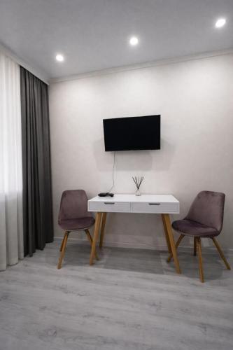 TV i/ili multimedijalni sistem u objektu Pelivan Studio