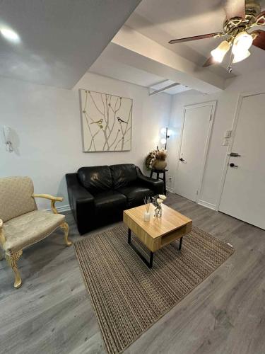 a living room with a couch and a coffee table at Lovely apartment for rent in Vitry-sur-Seine