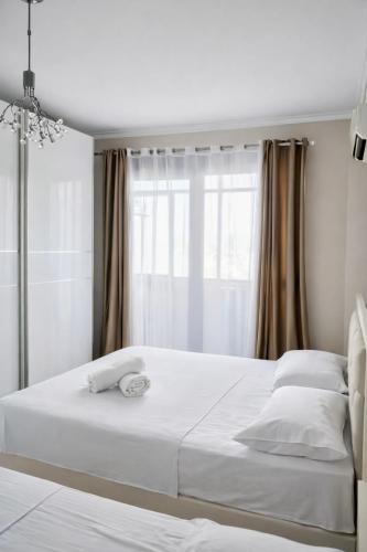 Krevet ili kreveti u jedinici u okviru objekta Boulevard Views Residence