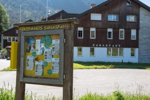 a sign in front of a building at juhui Lenzerheide in Lenzerheide