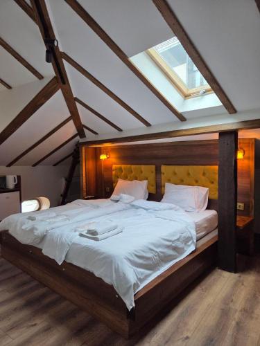 Llit o llits en una habitació de MariaApartments