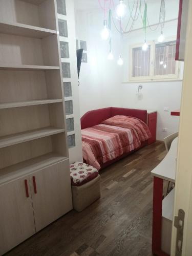 a bedroom with a bed in a room at Flat26 in Castiglion Fiorentino