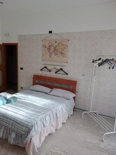 a bedroom with a bed in a room at Fashion room in Altamura