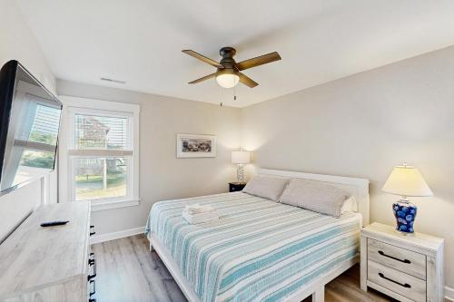 a bedroom with a bed and a ceiling fan at AV723 Prickly Pear 723 in Avon