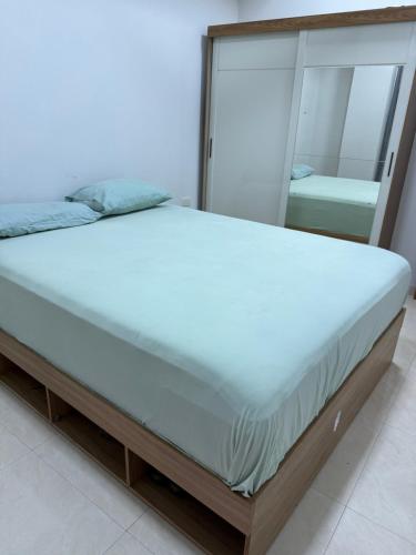 Llit o llits en una habitació de Oasis