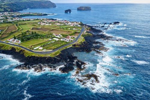 an aerial view of an island in the ocean at Sea Roots "Sea Zone" in Mosteiros