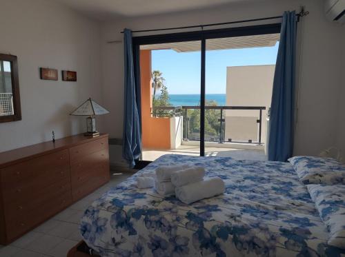 En eller flere senge i et værelse på Giada Apartment