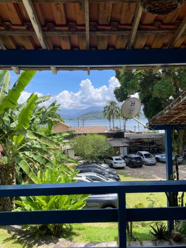 a view of the ocean from a balcony at Suítes Sabor e Mar in Angra dos Reis