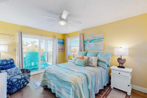 a bedroom with a bed and a ceiling fan at AVPP4 Sunset Terrace in Avon