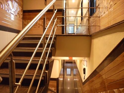 a view of a staircase in a building at Hotel Great Western in Kolkata