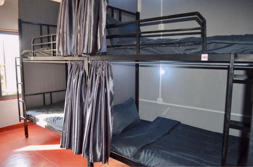 Palanda nebo palandy na pokoji v ubytování Aroma Hostel