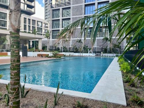 a swimming pool in the middle of a building at SOP 82 Stylish and Cozy Two-Bedroom Apt in Sydney