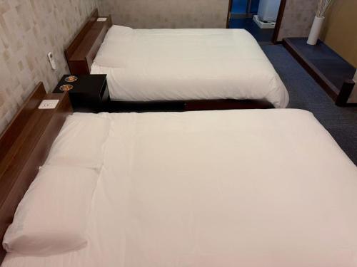 和居 貝 大きなベッド 静かな場所で快適に過ごせる宿