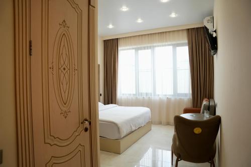מיטה או מיטות בחדר ב-Luxury Collection Hotel