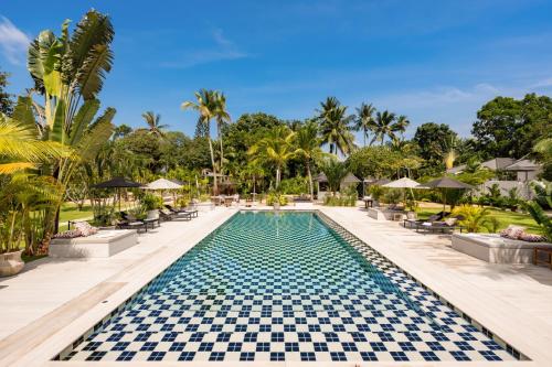 a pool at the resort at Moorea Boutique Resort Samui in Ban Tai
