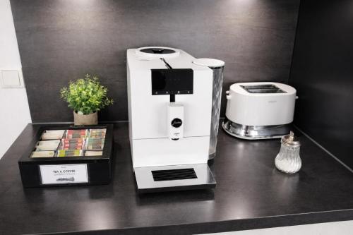 a coffee machine sitting on top of a counter at Allgäu Space in Marktoberdorf