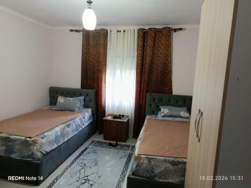 Llit o llits en una habitació de Tafa House