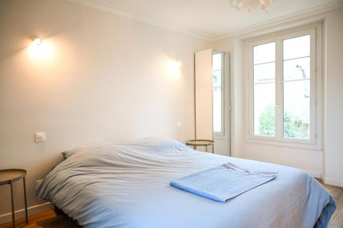 เตียงในห้องที่ L'appart des ormeaux