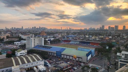 an overhead view of a city with a city skyline at Gradient Sky in Manila