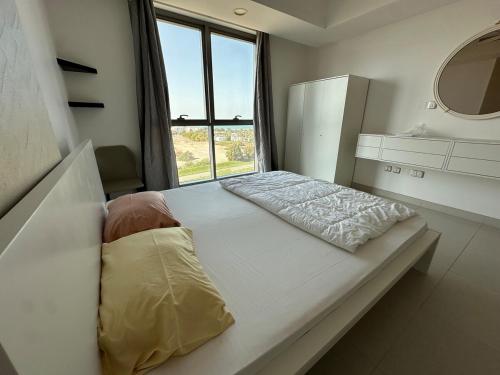 Voodi või voodid majutusasutuse Pinnacle Row Panoramic 2BR Oasis toas