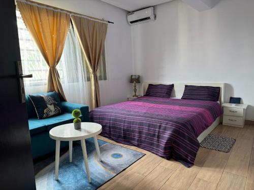 Postel nebo postele na pokoji v ubytování CNS Guest House