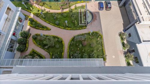 an overhead view of a garden on the side of a building at Pride homes in Marimbeti