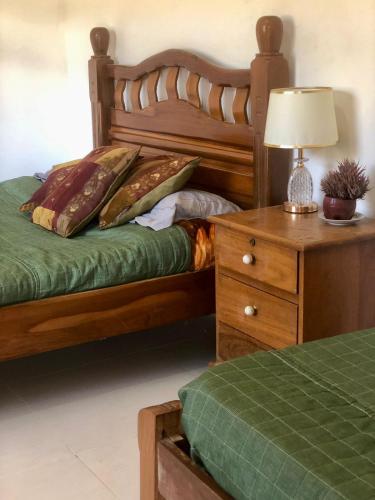 Llit o llits en una habitació de Looking Samaipata