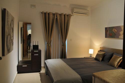 Ένα ή περισσότερα κρεβάτια σε δωμάτιο στο Luxury Apartment Marble Arch