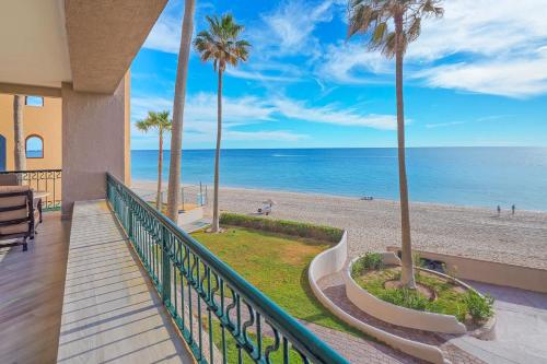a balcony with a view of the beach at Beachfront Oasis at Sonoran Spa E201 in Puerto Peñasco