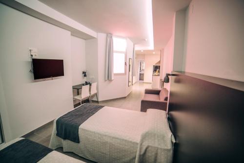 Μια τηλεόραση ή/και κέντρο ψυχαγωγίας στο Mannix Urban Apartments