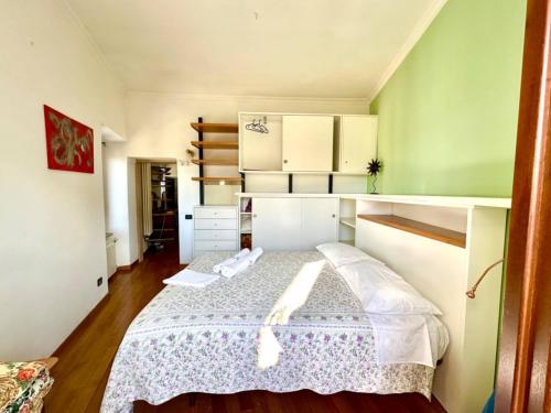 a bedroom with a large bed in a room at Oasi in Poggio Moiano