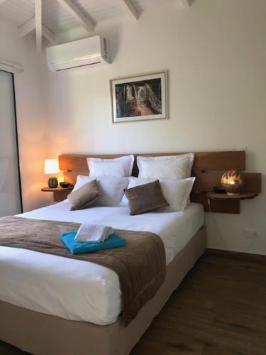 Llit o llits en una habitació de Ti'Tranquille