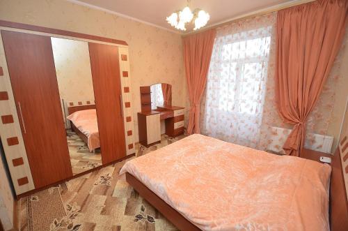 Postel nebo postele na pokoji v ubytování Apartment in the center on Spasskaya Street