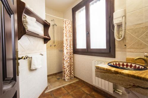 Kuchyň nebo kuchyňský kout v ubytování Arte Vida Suites & Spa