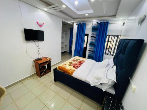 Llit o llits en una habitació de Samira Lodge