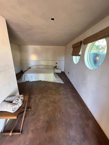 a bedroom with a bed in a small room at Kit Inn Wetrock in Moab
