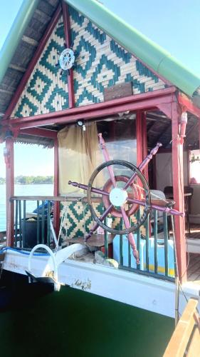 a bike sitting on the front of a boat at Check beth in Puerto Princesa City