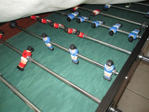a group of people playing a game of ping pong at Domaine des Charmilles in Mantenay-Montlin