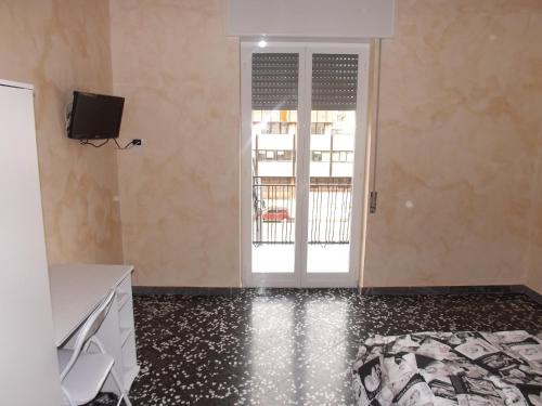 Televízia a/alebo spoločenská miestnosť v ubytovaní Bed And Breakfast Il Subacqueo